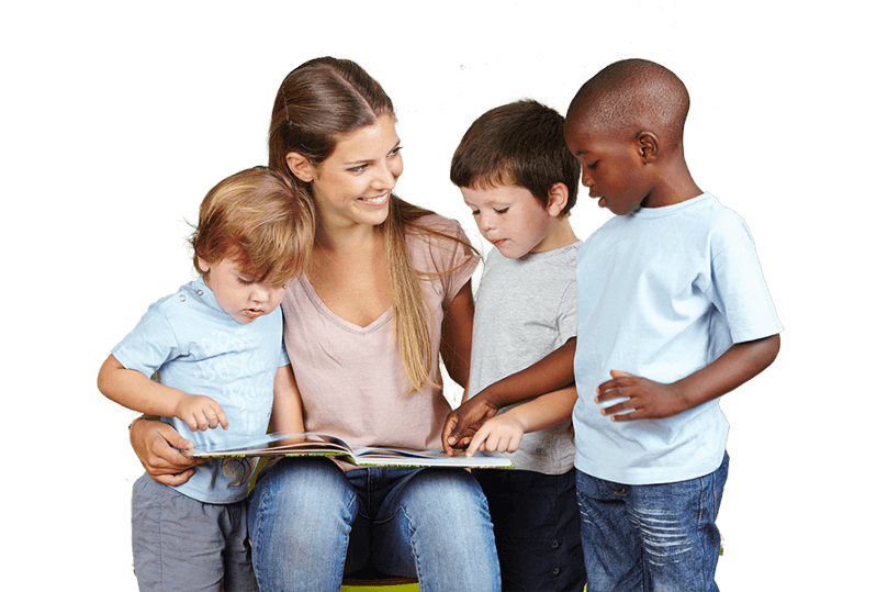 Teacher guiding students with technology